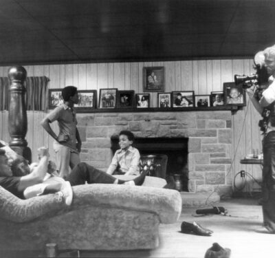 Muhammad Ali clowns before TV cameras in his cabin at Deer Lake in 1978.